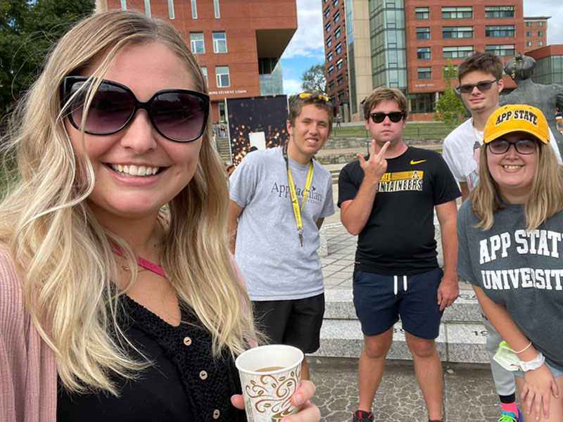 Several students on campus in App State gear